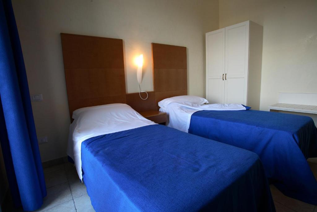 Hotel Resort Portoselvaggio 산티시도로 객실 사진